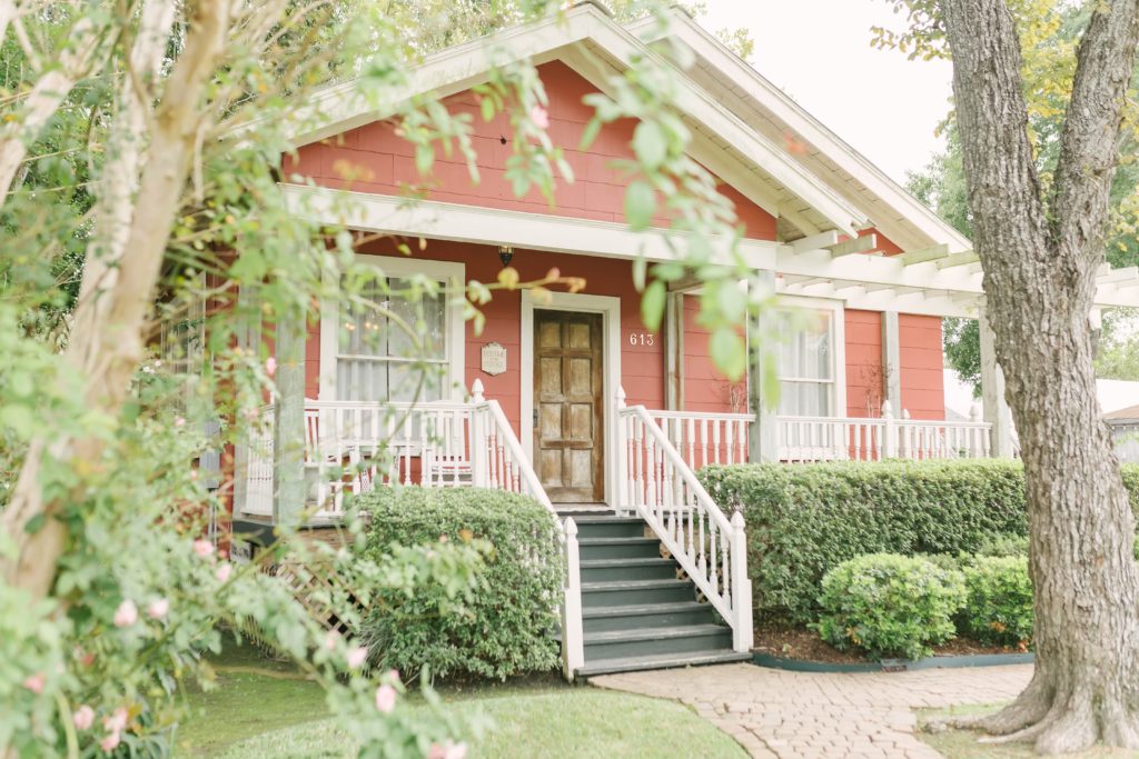 Red bridal cottage at the Butler's Courtyard Wedding venue in League City, TX