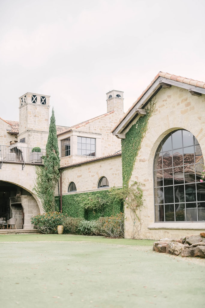 The Clubs at Houston Oaks facility adorned with green ivy on the Tuscan style villas.