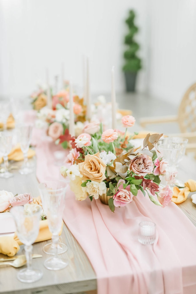 Beautiful blush and gold tablescape created by Jackie Trejo Floral Events at the Farmhouse wedding venue