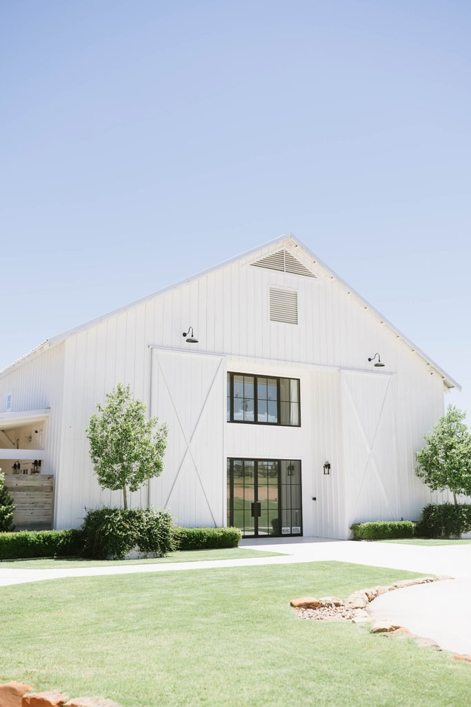 White barn wedding venue in Montgomery, TX. The Farmhouse Wedding Venue.