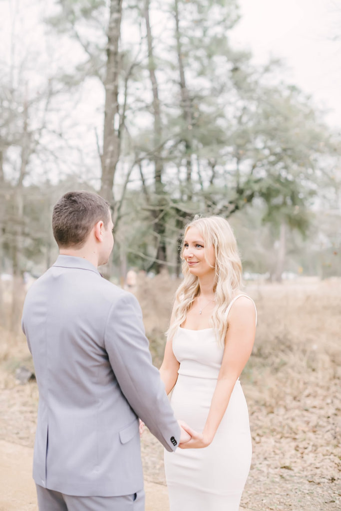 Bride and groom say I do during an intimate elopement at Memorial Park Eastern Glades. Houston elopement photographer. Houston wedding photographer.