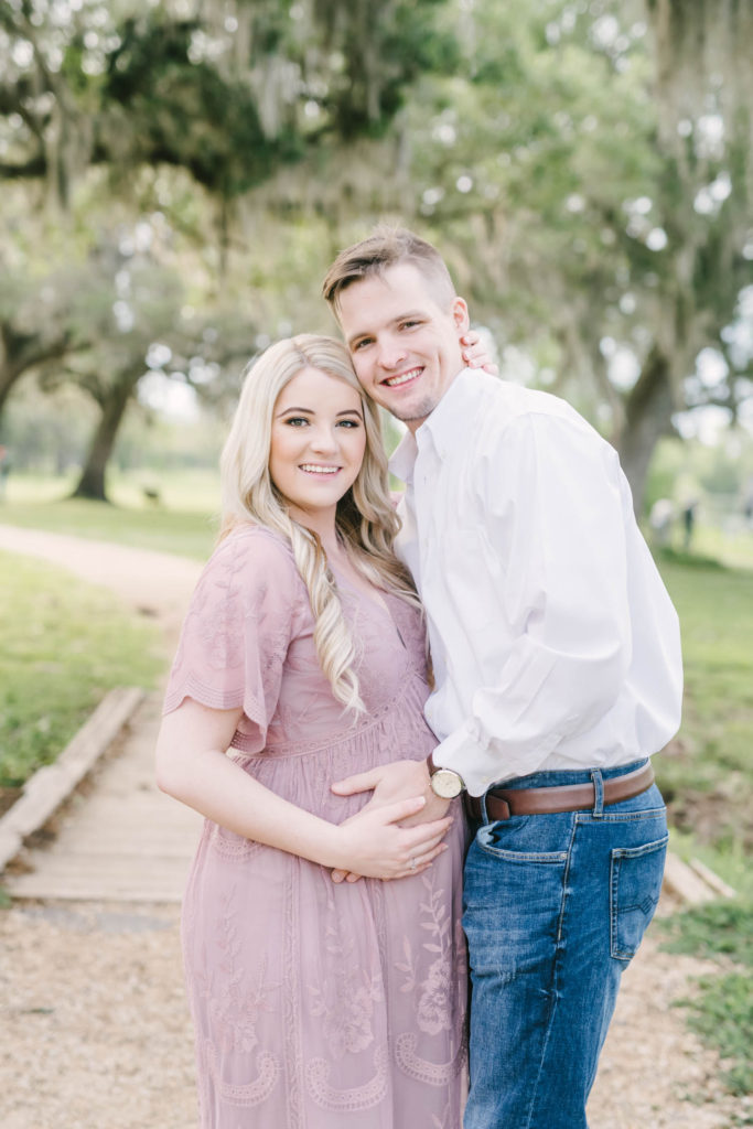 Darling husband and wife look so happy while awaiting their baby girl during a maternity session in Texas with Christina Elliott Photography. baby girl on the way femine maternity session #christinaeliottphotography #christinaelliotmaternity #brazosbendstatepark #houstonmaternityphotographer #parentstobe #babybumppicutes #houstonareaphotographer #professionalmaternityphotographer #houstonmaternity #preggo #pregnancyjournal #texasmaternityphotographer