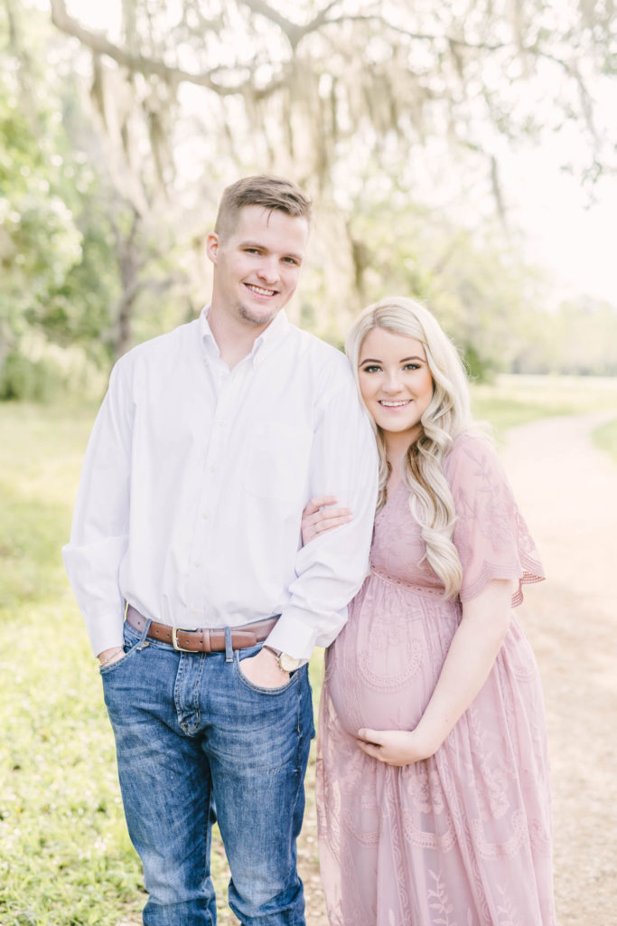 A close up photo of two soon to be parents of a sweet baby girl in Houston by Christina Elliott Photography. maternity portrait pregnancy fashion nine months pregnant pregnant with a girl #christinaeliottphotography #christinaelliotmaternity #brazosbendstatepark #houstonmaternityphotographer #parentstobe #babybumppicutes #houstonareaphotographer #professionalmaternityphotographer #houstonmaternity #preggo #pregnancyjournal #texasmaternityphotographer