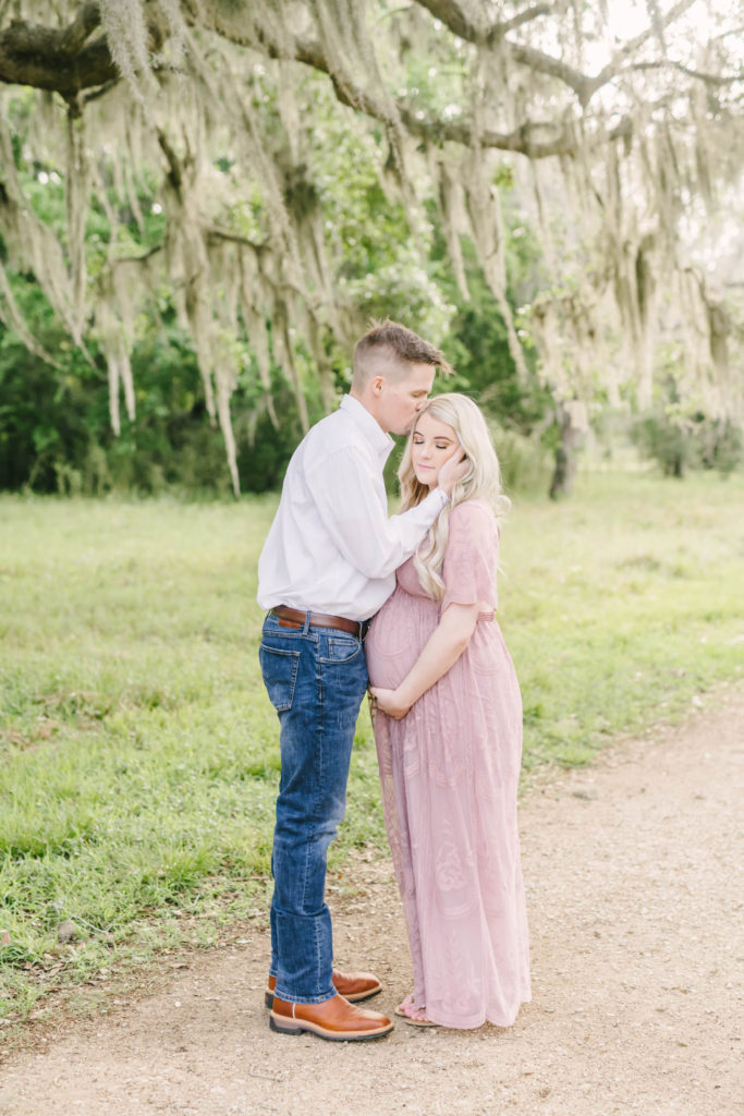 At Brazos Bend State Park Christina Elliott Photography a professional maternity photographer captures an authentic moment between an expecting husband and wife. authentic maternity photos baby girl on the way #christinaeliottphotography #christinaelliotmaternity #brazosbendstatepark #houstonmaternityphotographer #parentstobe #babybumppicutes #houstonareaphotographer #professionalmaternityphotographer #houstonmaternity #preggo #pregnancyjournal #texasmaternityphotographer