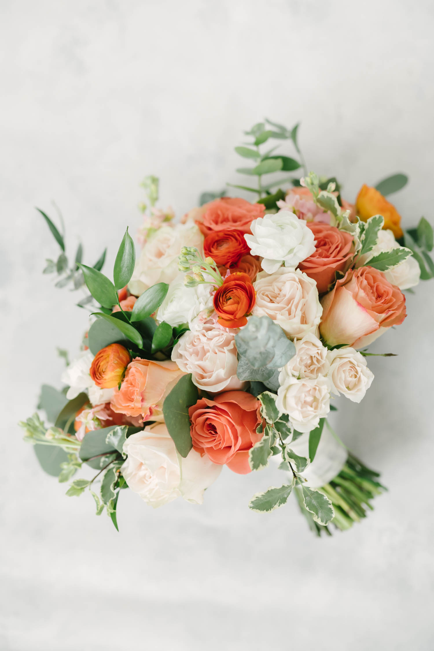 Beautiful coral and white floral arrangement with roses and eucalyptus for wedding in wallisville texas by Christina Elliott Photography. wedding floral arrangements spring wedding florals coral floral arrangements #christinaelliotphoto #christinaelliotphotography #christinaelliotelopements #elopementphotographer #wallisvillewedding #houstontexaswedding #houstonweddingphotographer #trinityfarmhouse #texaselopements #elopement #springwedding