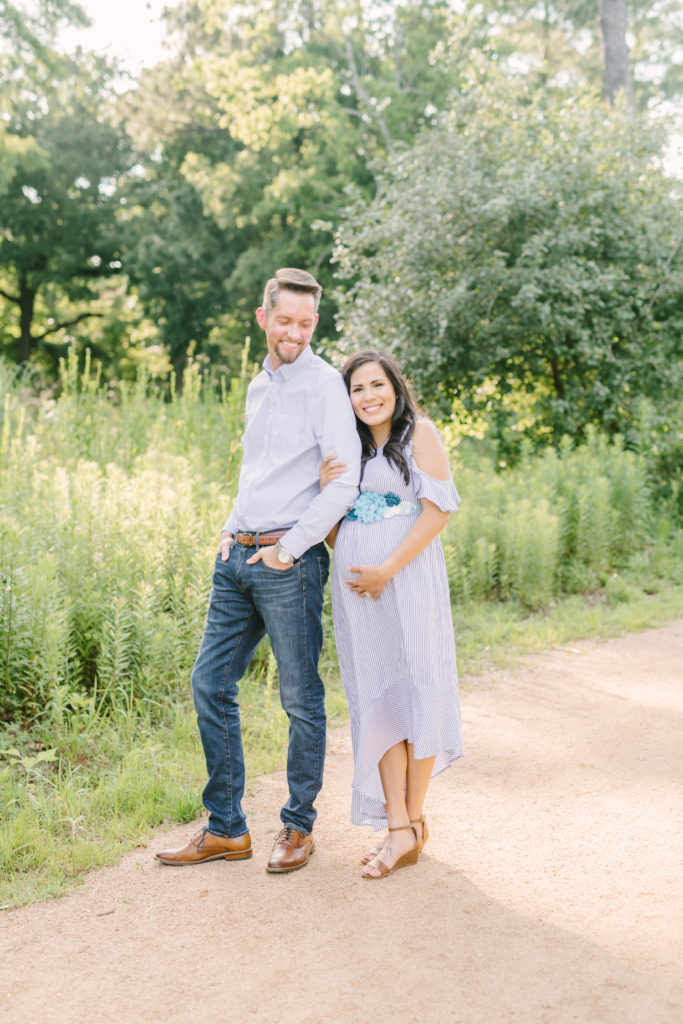 Gorgeous couple in a maternity photoshoot wearing a purple dress in Texas by Christina Elliot Photography in Texas. outfit inspo for maternity shoot how to dress for maternity photos when should i take maternity photos couple maternity photoshoot summer colors for photoshoot dressing your bump for photoshoot maternity photographer in texas #maternityphotos #maternityphotoshoot #maternityphotographers #texasmaternityphotographers #outfitinspoformaternityphotoshoot