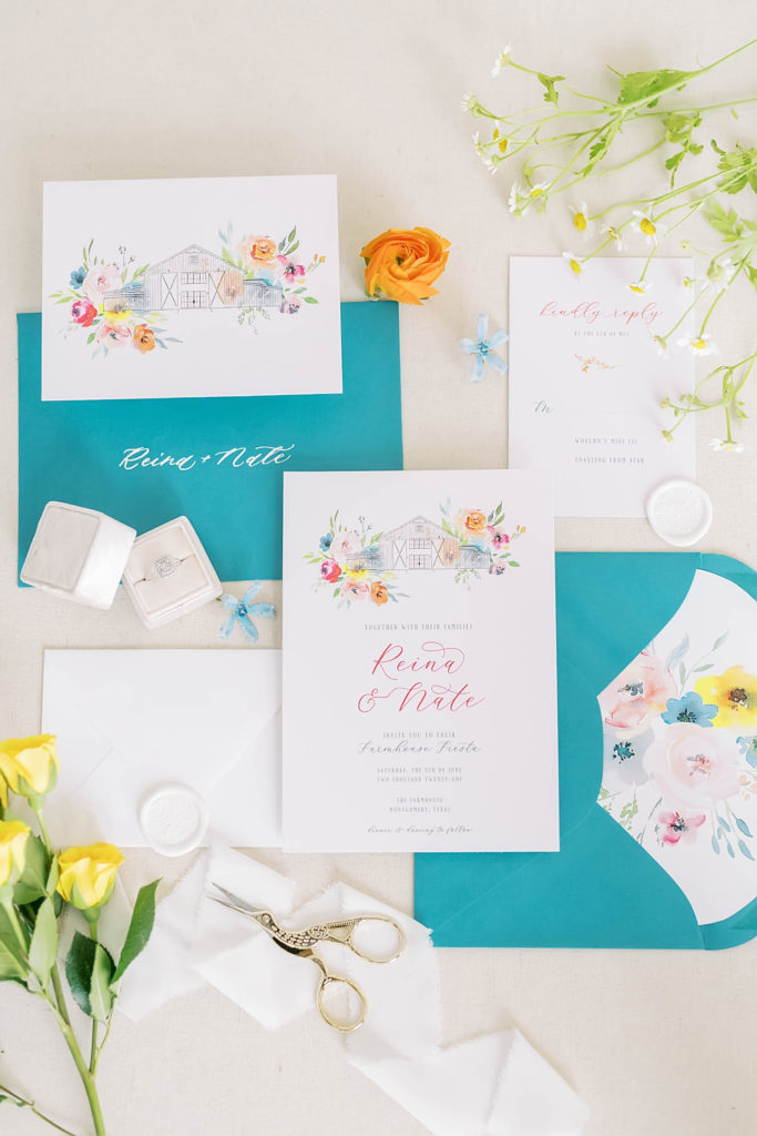 Beautiful wedding invites with teal and orange painted flowers by Texas by Christina Elliot Photography. best texas wedding locations best wedding photographer in texas planning your wedding in texas how to plan your farmhouse wedding orange and blue colors for wedding invitation inspo wedding colors bright summer wedding colors #texasweddingphotographer #farmhousewedding #farmhouseweddinginspo #texasphotographer #farmhouseweddingdecor #texasweddinglocations