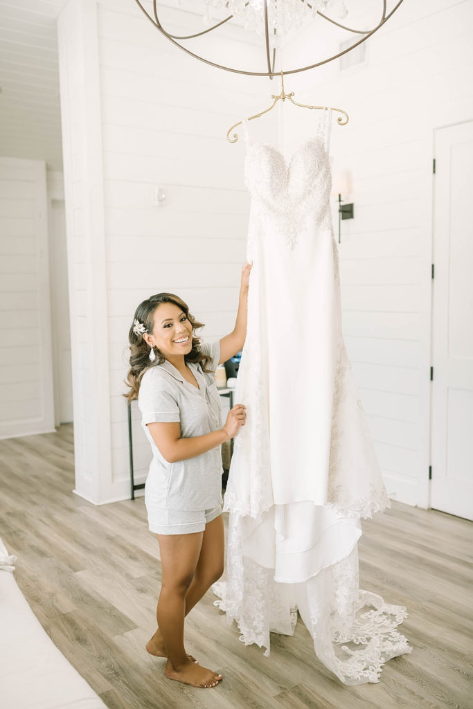 Beautiful bride getting ready for wedding with a white sweetheart dress for a farmhouse wedding in Texas by Christina Elliot Photography. wedding day how to dress sweetheart dress hair inspo for wedding farmhouse wedding how to dress as the bride white dresses for wedding getting ready photos for wedding texas wedding photographer how to plan your wedding texas wedding locations #texasweddingphotographer #farmhousewedding #farmhouseweddinginspo #texasphotographer #farmhouseweddingdecor #texasweddinglocations
