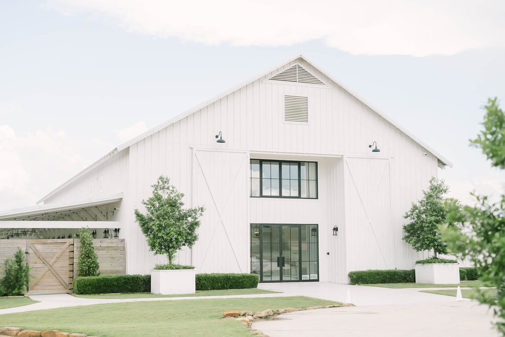 In Texas by Christina Elliot Photography with a gorgeous white barn making for the perfect farmhouse wedding. farmhouse wedding inspo ideas for farmhouse wedding how to plan a farmhouse wedding white barn for wedding best texas wedding locations best wedding photographer in texas planning your wedding in texas how to plan your farmhouse wedding #texasweddingphotographer #farmhousewedding #farmhouseweddinginspo #texasphotographer #farmhouseweddingdecor #texasweddinglocations