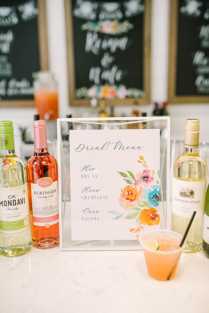 In Texas by Christina Elliot Photography a beautiful drink menu with pink flowers and perfect for a summer wedding. farmhouse wedding inspo ideas for farmhouse wedding how to plan a farmhouse wedding white barn for wedding best texas wedding locations best wedding photographer in texas planning your wedding in texas how to plan your farmhouse wedding #texasweddingphotographer #farmhousewedding #farmhouseweddinginspo #texasphotographer #farmhouseweddingdecor #texasweddinglocations