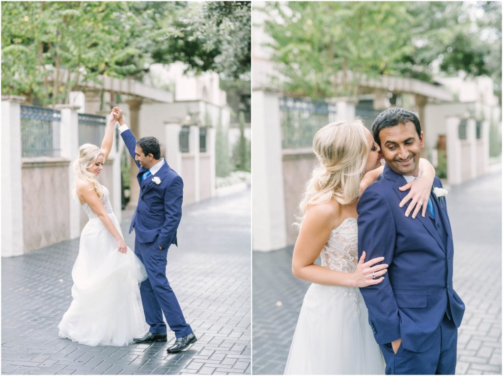 Bride and groom dance in the courtyard of Houston wedding venue The Bell Tower of 34th by Christina Elliott Photography, a wedding photographer. bride and groom dance wedding action shots tulle dress #christinaelliottphotography #christinaelliottweddings #thebelltoweron34th #belltowerwedding #houstonweddings #houstonweddingphotographers #mrandmrs #newlymarried #weddinginspiration #bridalgown #groomstyle #texasweddingphotographers #tietheknot #traditionalindianwedding
