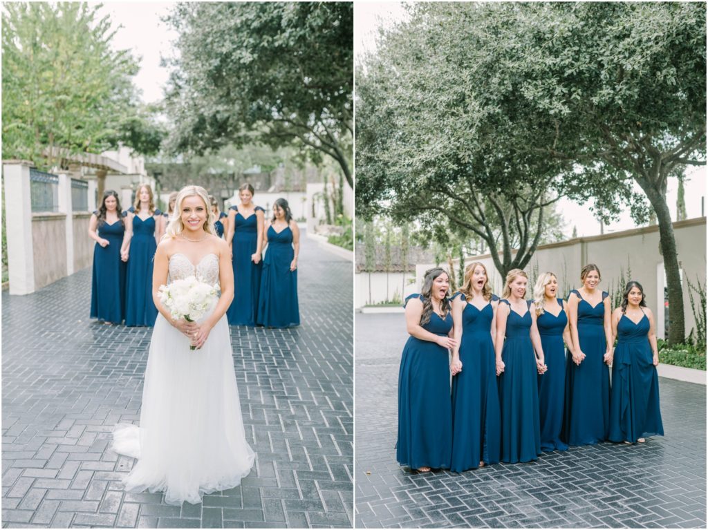 Bridesmaids in blue dresses see the bride for the first time and are so excited by Christina Elliott Photography in Houston. blue summer bridesmaid dresses bride and party first look by bridesmaids #christinaelliottphotography #christinaelliottweddings #thebelltoweron34th #belltowerwedding #houstonweddings #houstonweddingphotographers #mrandmrs #newlymarried #weddinginspiration #bridalgown #groomstyle #texasweddingphotographers #tietheknot #traditionalindianwedding