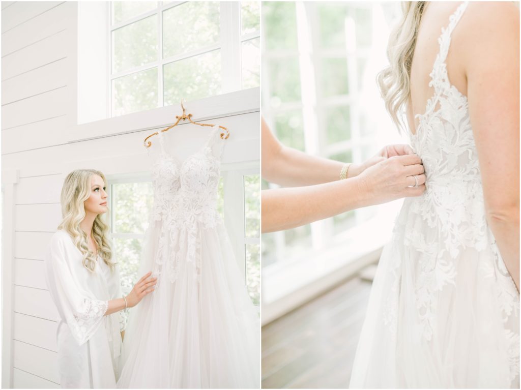 The bride stands near a bright light window and looks at her beautiful dress all in white by Christina Elliott Photography in Conroe, Texas. bride and her dress stunning wedding dress getting ready for the wedding #christinaelliottphotography #christinaelliottweddings #houstontx #houstonweddings #houstonweddingphotographers #carriagehousewedding #conroetexas #texasweddingvenues #carriagehousechapel #cottageweddings #farmhousewedding #sweatheartweddinggown #countrywedding #weddinginspiration