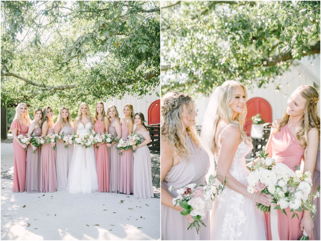 Houston wedding photographer captures the bridesmaids and bride smiling under a green leaf tree with golden sunlight by Christina Elliott Photography. wedding gown inspiration large bridal party outfit ideas #christinaelliottphotography #christinaelliottweddings #houstontx #houstonweddings #houstonweddingphotographers #carriagehousewedding #conroetexas #texasweddingvenues #carriagehousechapel #cottageweddings #farmhousewedding #sweatheartweddinggown #countrywedding #weddinginspiration