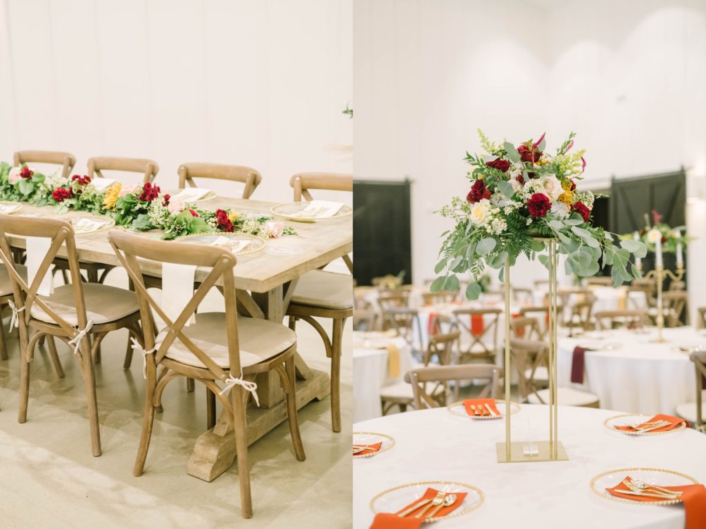 Vaulted floral centerpieces on white table cloths with orange napkins and gold silverware by Christina Elliott Photography. fall wedding luncheon wedding centerpiece #christinaelliottphotography #texasweddingphotographer #ranchwedding #countrychic