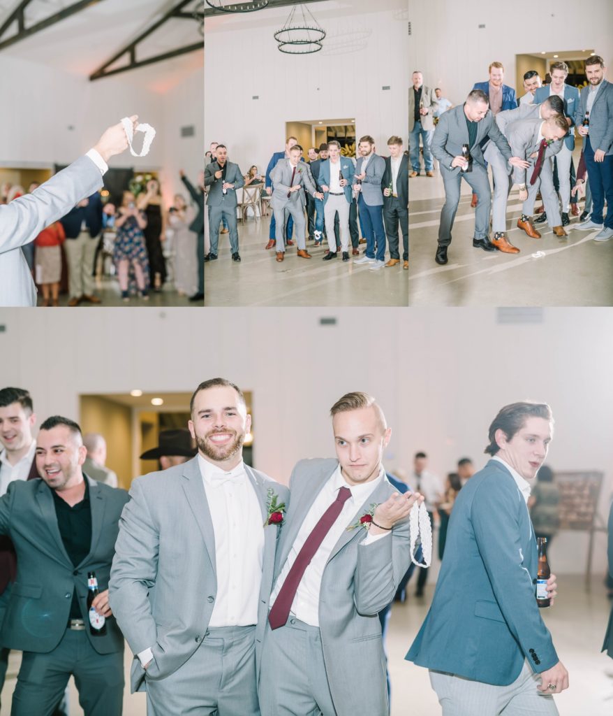 At Still Waters Ranch Texas the groom wearing a gray suit parties with his groomsmen by Christina Elliott Photography. reception photography groomsmen style #christinaelliottphotography #texasweddingphotographer #ranchwedding #countrychic