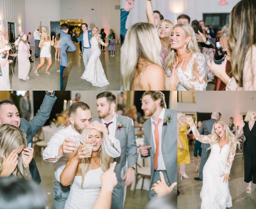 Bride dances at the reception while having party drinks with Christina Elliott Photography in Texas. lace sleeves fun receptions Still Waters Ranch wedding venue #christinaelliottphotography #texasweddingphotographer #ranchwedding #countrychic