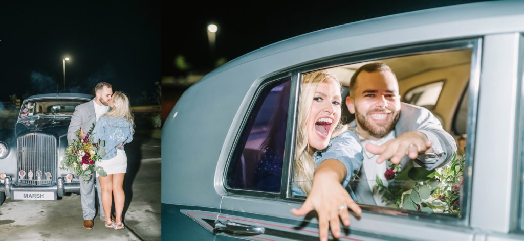Newlyweds drive away in a blue Oldsmobile car while showing off their wedding rings out the window by Christina Elliott Photography. wedding car newly-weds #christinaelliottphotography #texasweddingphotographer #ranchwedding #countrychic