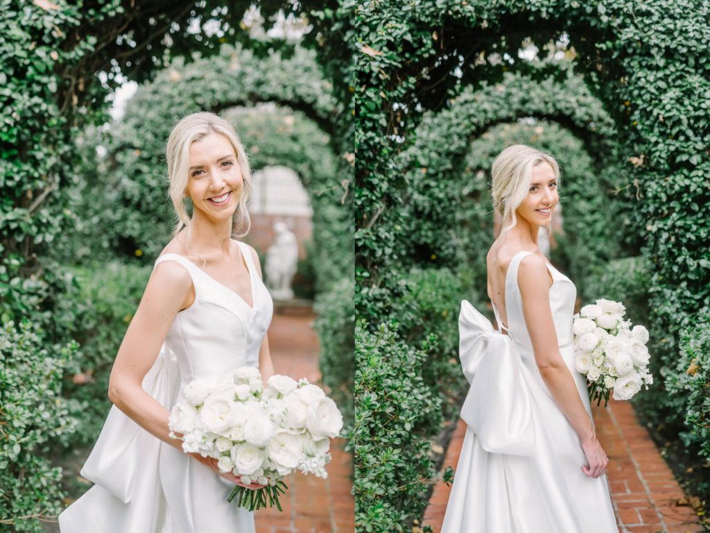 A bride wearing a silk simple wedding gown with a large bow on the back captured by Christina Elliott Photography. bow on wed gown deep v dress back #christinaelliottphotography #houstonweddings #riveroaksgardenclub #outdoorbridals #houstonbridals
