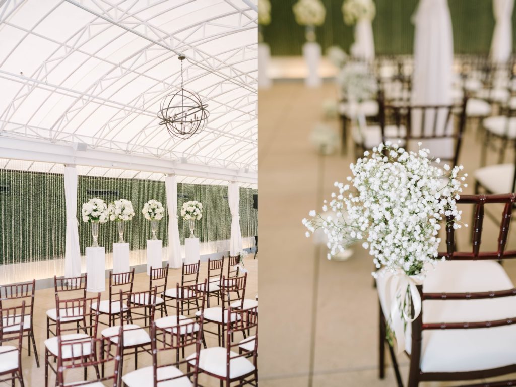 Christina Elliott Photography captures an indoor wedding set up located in a greenhouse with baby's breath flowers. greenhouse wedding bright indoor wedding #christinaelliottphotography #thesamhoustonhotel #houstonweddings #TXweddingphotographer