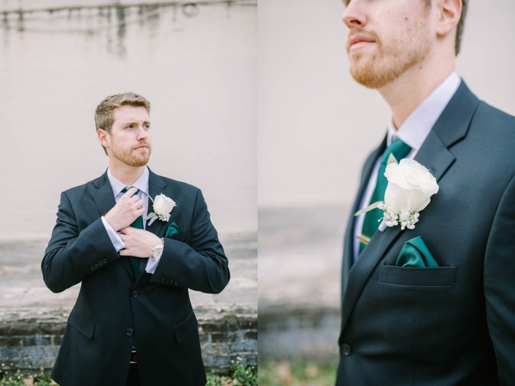 Detailed photo of groom's style with a black suit, emerald green tie, and pocket square captured by Christina Elliott Photography. groom fashion green and black #christinaelliottphotography #thesamhoustonhotel #houstonweddings #TXweddingphotographer