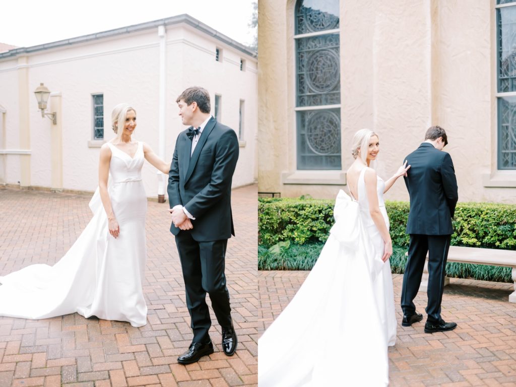 Christina Elliott Photography captures the bride showing the groom her wedding gown outside a chapel. chapel marriage first look #christinaelliottphotography #Houstonweddings #catholicchurchweddings #navyblue #sayIdo #Houstonweddingphotographers
