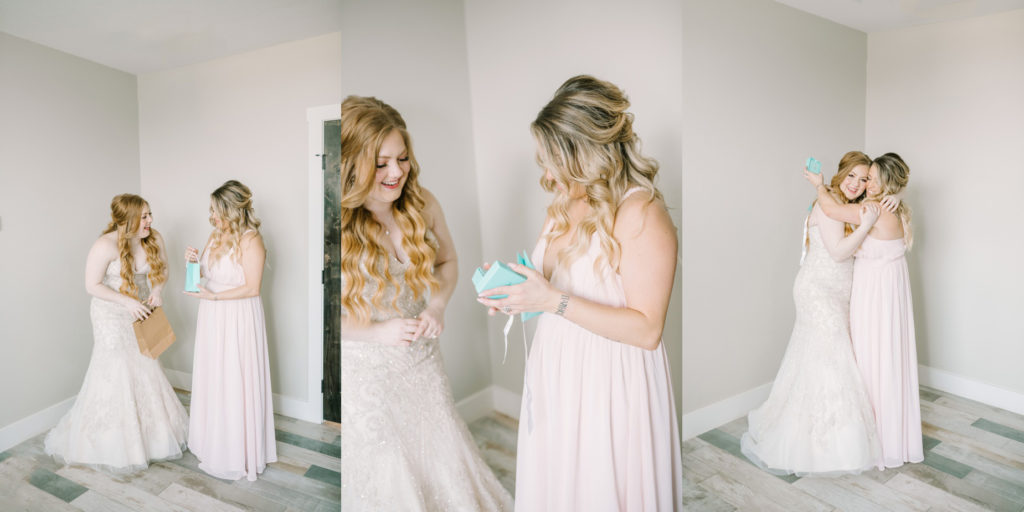 The bride gifts her maid of honor a keepsake captured by Christina Elliott Photography. Still Waters Ranch wedding photography #ChristinaElliottPhotography #ChristinaElliottWeddings #StillWatersRanchWedding #Texaswedding #countrywedding #ranchwedding