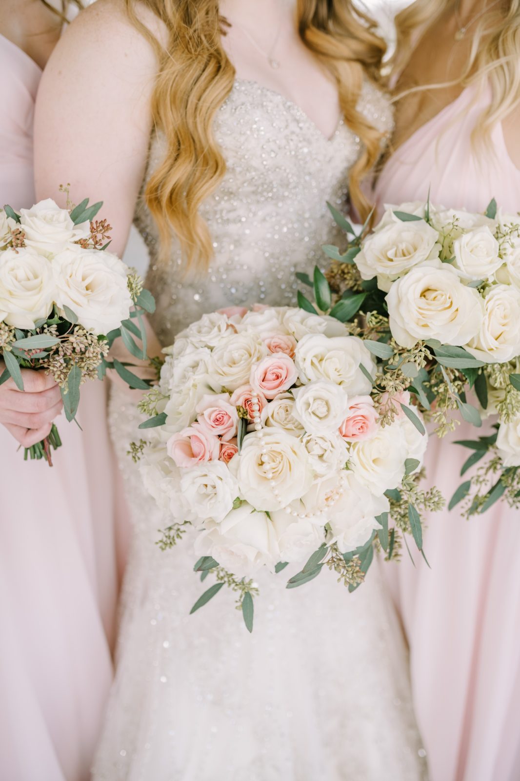 At Still Waters Ranch Christina Elliott Photography captures a detailed shot of the bridal bouquet. rose bridal bouquet pink #ChristinaElliottPhotography #ChristinaElliottWeddings #StillWatersRanchWedding #Texasweddings #countrywedding #ranchwedding