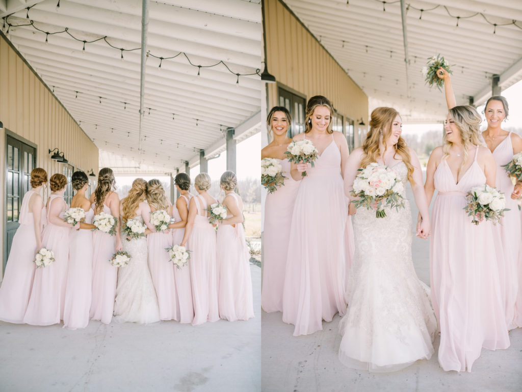 Bride hugs all her bridesmaids on a rustic porch at Still Waters Ranch by Christina Elliott Photography. hugging portrait #ChristinaElliottPhotography #ChristinaElliottWeddings #StillWatersRanchWedding #Texasweddings #countrywedding #ranchwedding