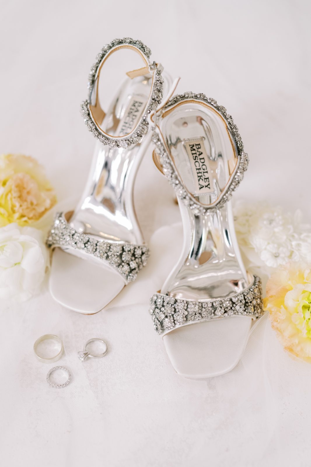 Silver diamond studded wedding stiletto shoes next to the wedding ring by Christina Elliott Photography. bridal shoes silver #ChristinaElliottPhotography #ChristinaElliottWeddings #Houstonweddings #TheSpringsVenue #EastHoustonweddings #Mrs #Mr