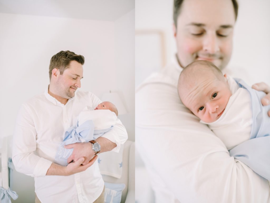 A father holds his newborn baby in his arms in Houston by Christina Elliott Photography. father and newborn baby with big eyes #ChristinaElliottPhotography #ChristinaElliottNewborns #HoustonLifestyleNewborns #HoustonFamilyPhotographer
