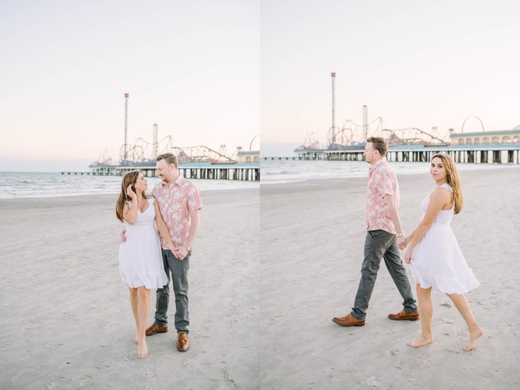 On a beach in Galveston an engaged couple walk hand-in-hand by Christina Elliott Photography. Beach couple portraits #ChristinaElliottPhotography #ChristinaElliottEngagements #TheTremontHouse #Texasengagements #shesaidyes