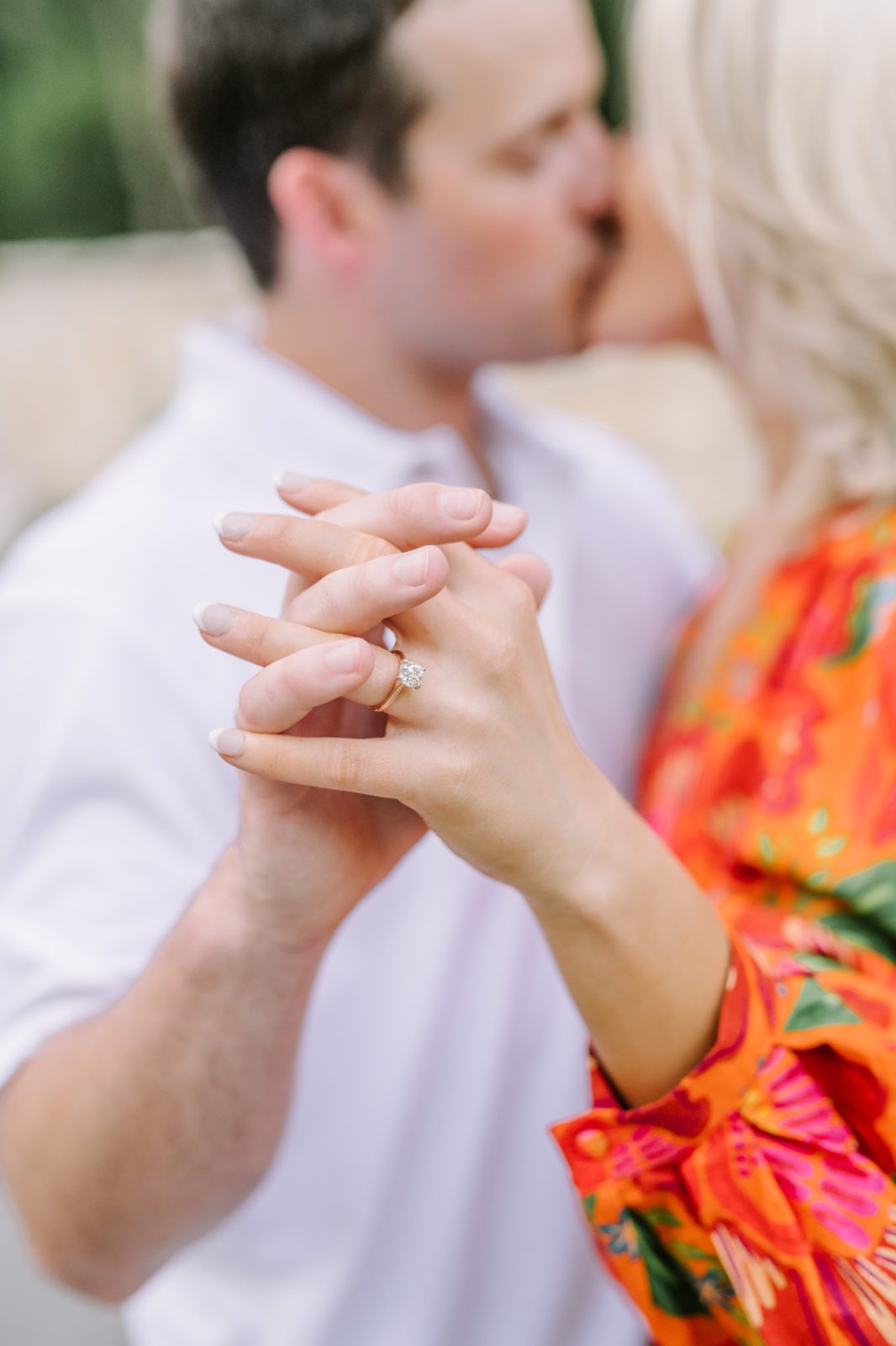 A close-up detailed portrait of a man and woman holding hands wearing a wedding ring by Christina Elliott Photography. wedding ring #ChristinaElliottPhotography #ChristinaElliottEngagements #LakeLivingston #summerengagements #Texasphotographer