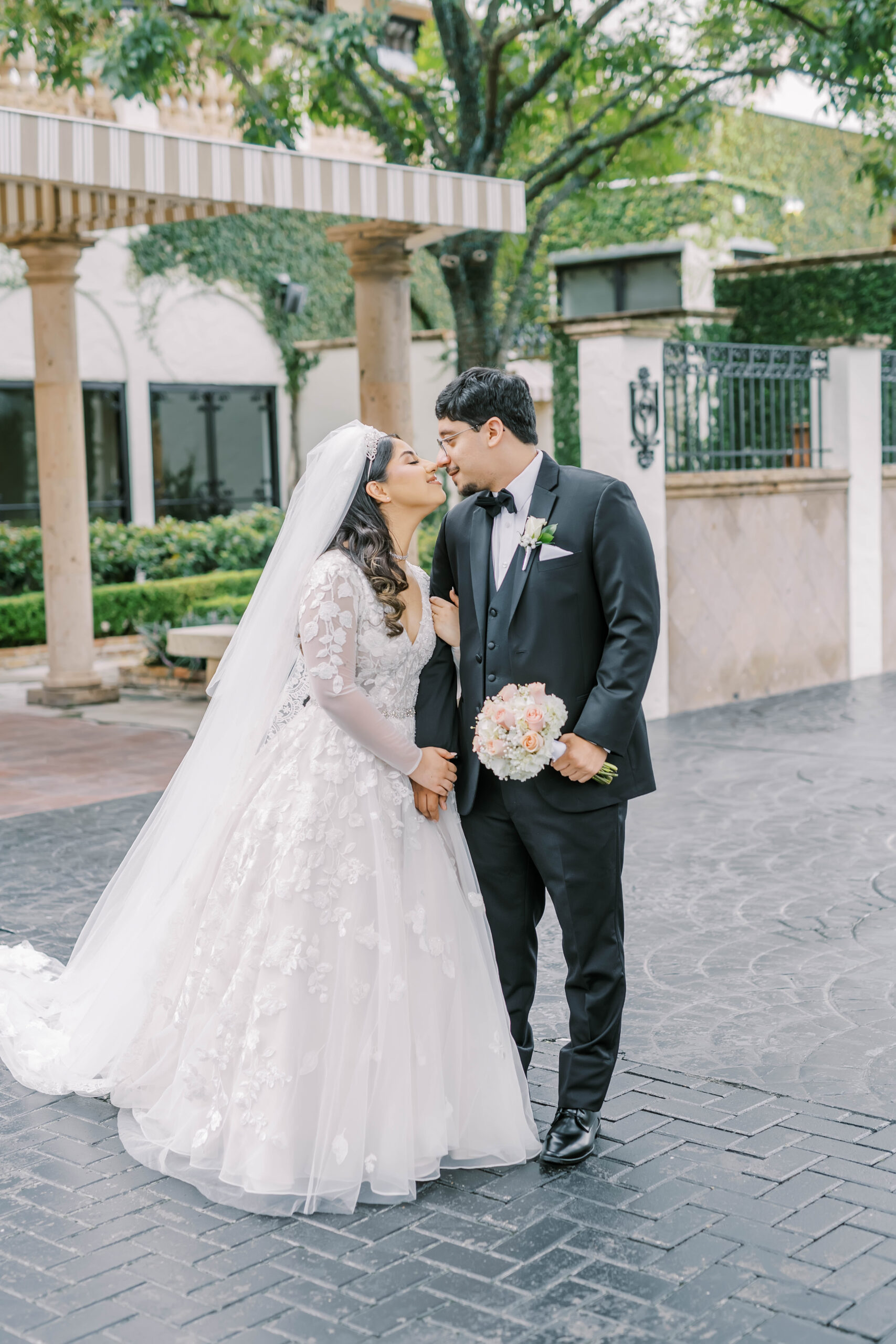 Bride and groom portraits from an intimate Houston Bell Tower on 34th wedding
